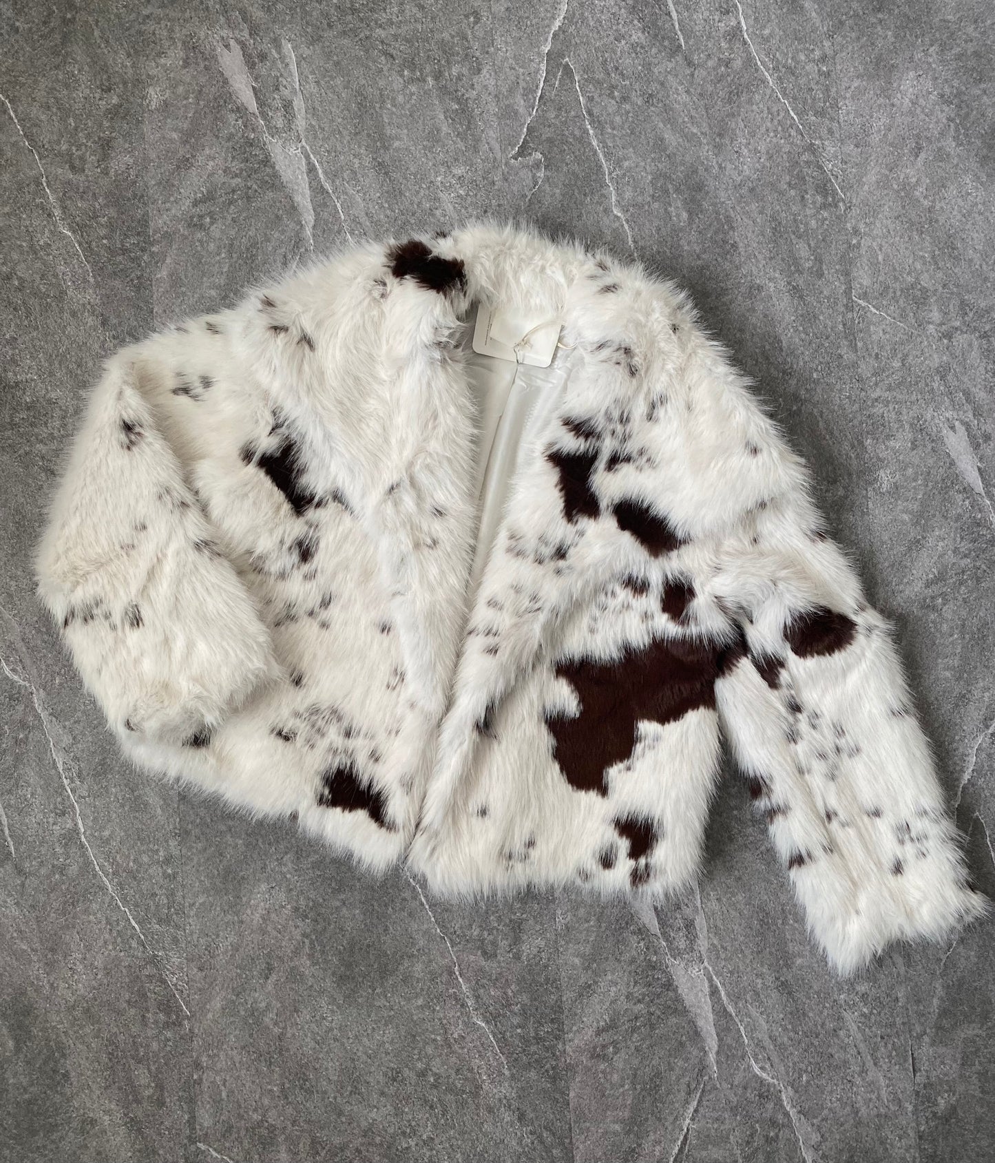 Pelliccia sintetica muccata