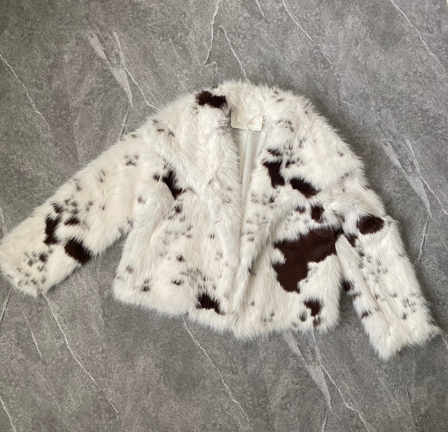 Pelliccia sintetica muccata